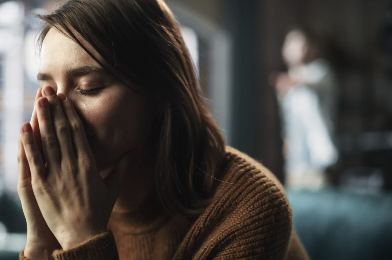 girl holding a broken and repaired bowl, representing beauty in the brokenness